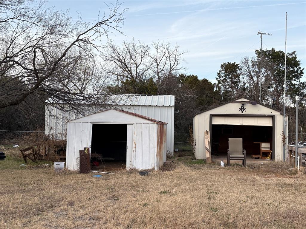 514 Fish Haven Road Graford, TX 76449 - Photo 18 of 21 a view of a house with a yard and garage