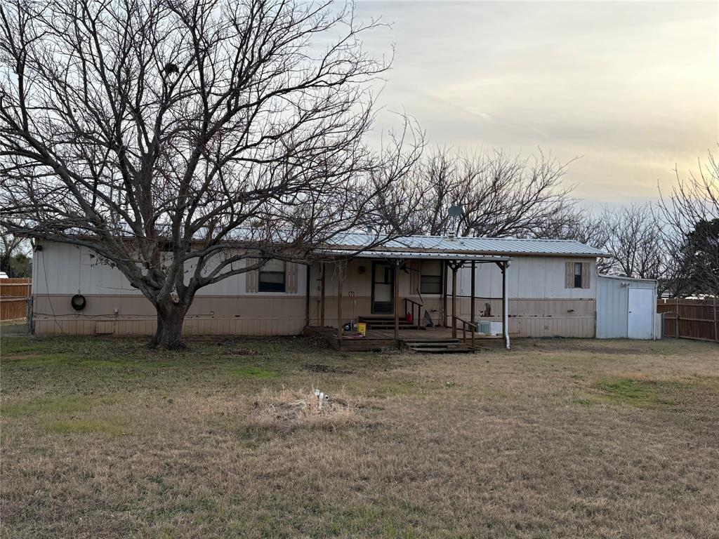 514 Fish Haven Road Graford, TX 76449 - Photo 20 of 21 a view of a house with a yard and a large tree