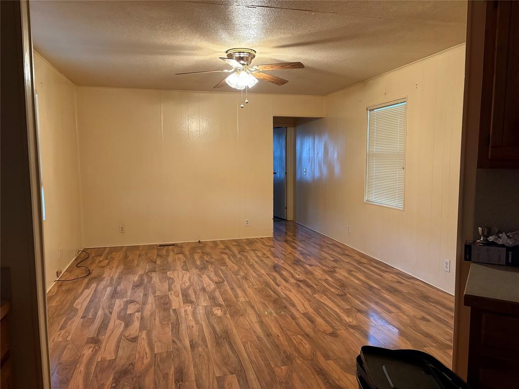 514 Fish Haven Road Graford, TX 76449 - Photo 5 of 21 a view of an empty room and wooden floor