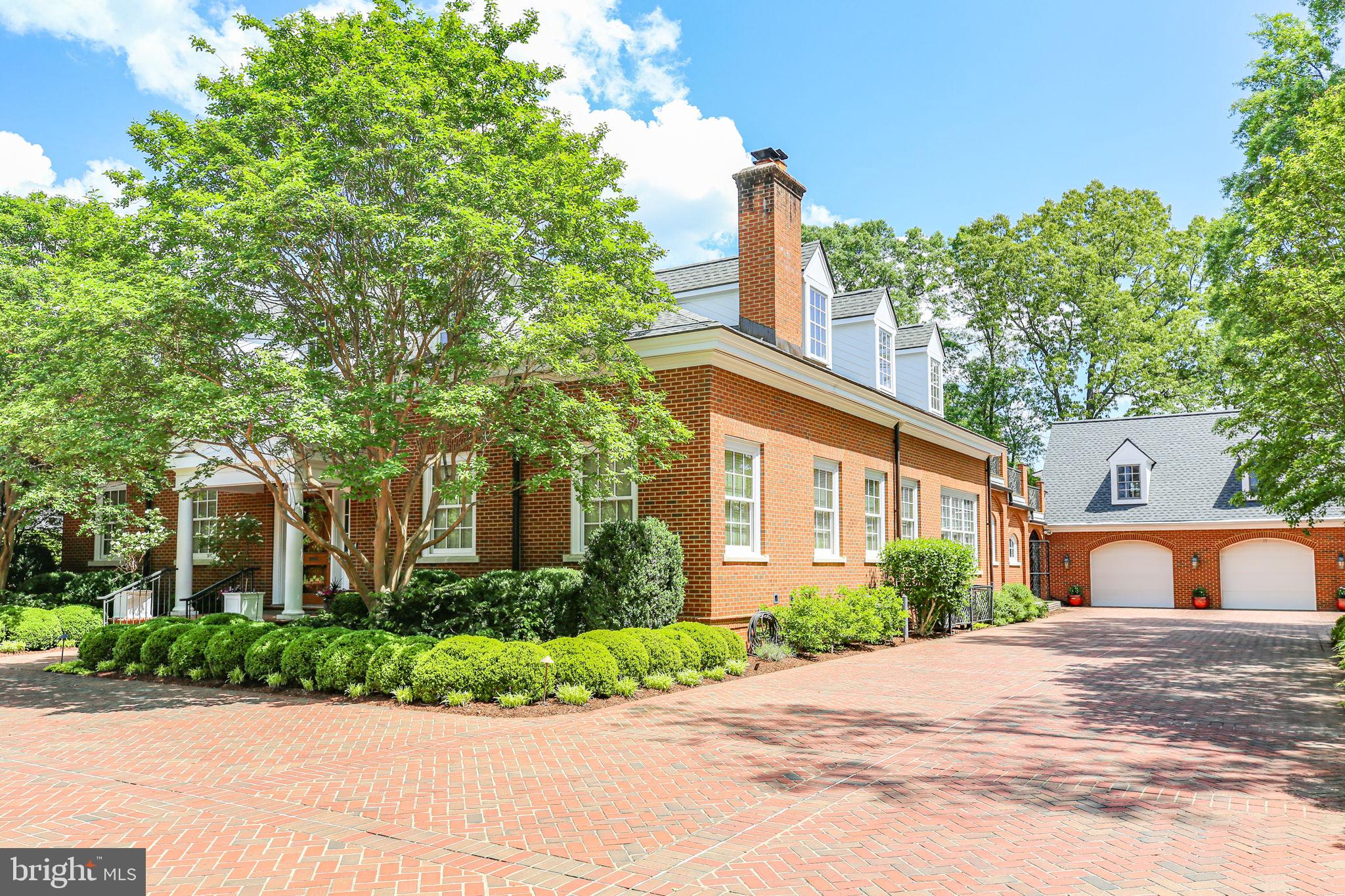 1711 Highland Road Fredericksburg, VA 22401 - Photo 12 of 145 a front view of a house with a yard and potted plants