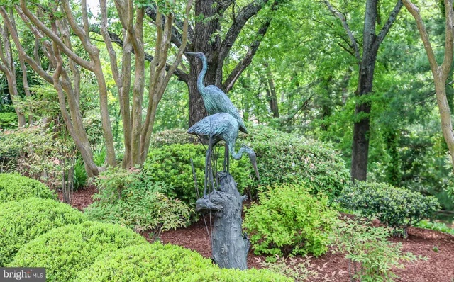 a bedroom with a bed and a television
