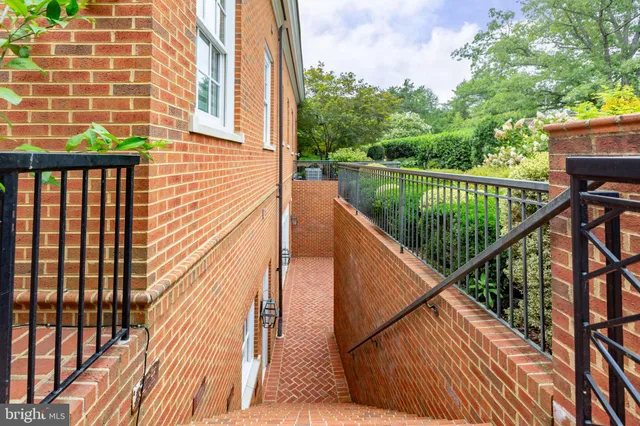 a bathroom with a granite countertop toilet sink and bathtub