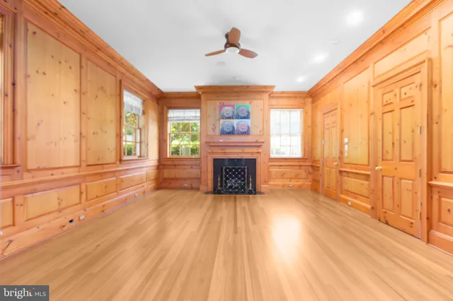 a kitchen with stainless steel appliances granite countertop a refrigerator a stove and a sink