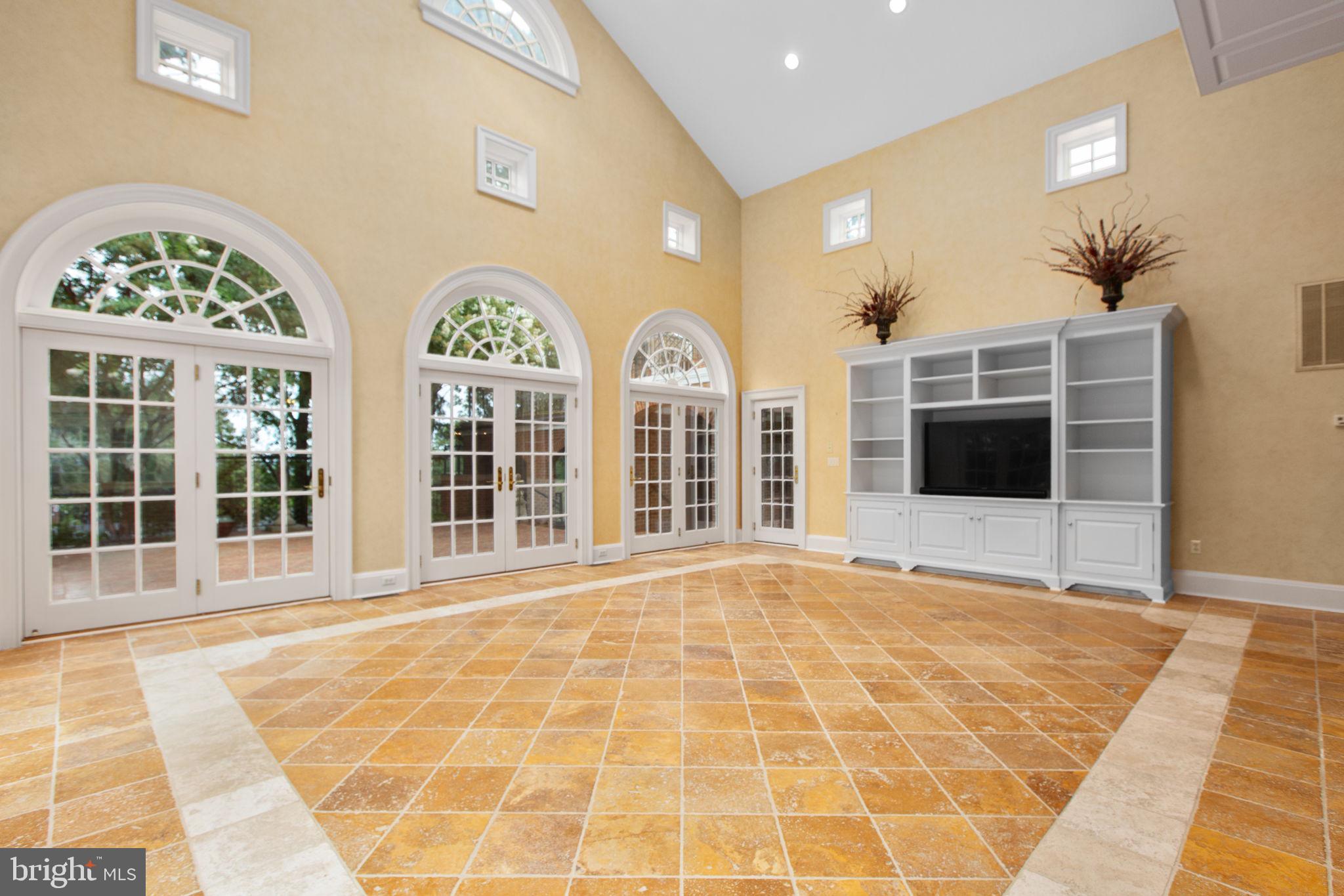 1711 Highland Road Fredericksburg, VA 22401 - Photo 62 of 145 a view of an empty room with a fireplace and windows