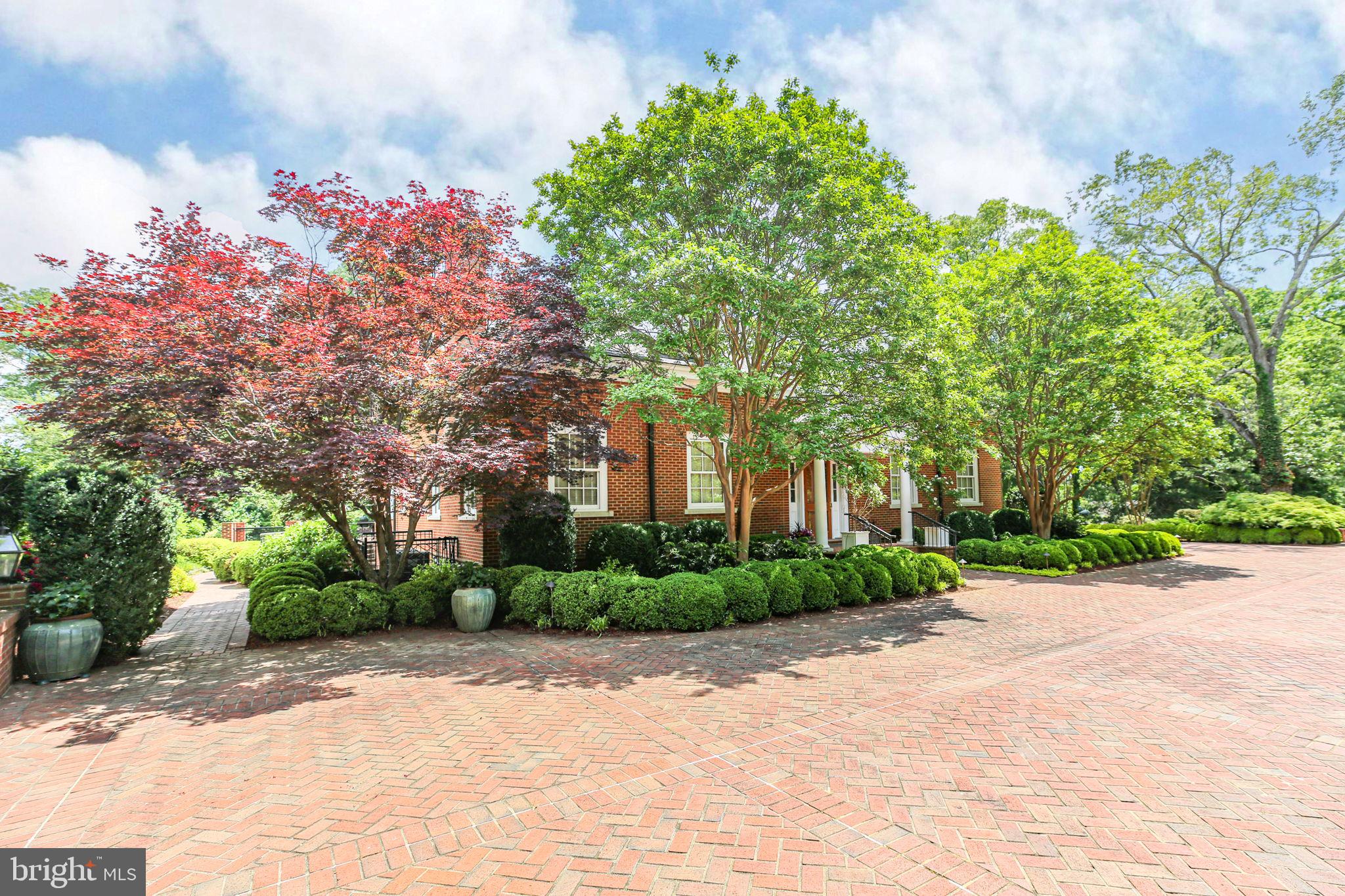 1711 Highland Road Fredericksburg, VA 22401 - Photo 9 of 145 a front view of a house with a yard and a garage