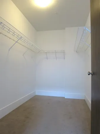 a view of a room with racks on the wall