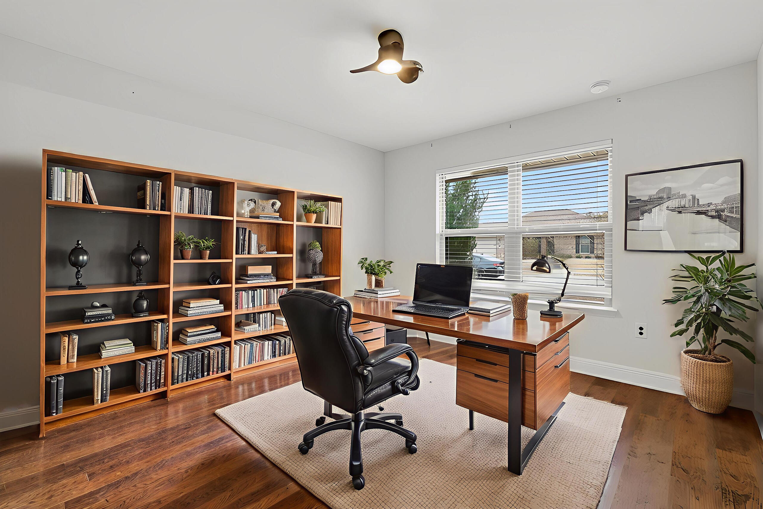 5733 Marigold Loop Crestview, FL 32539 - Photo 12 of 45 a view of a workspace with furniture and a bookshelf