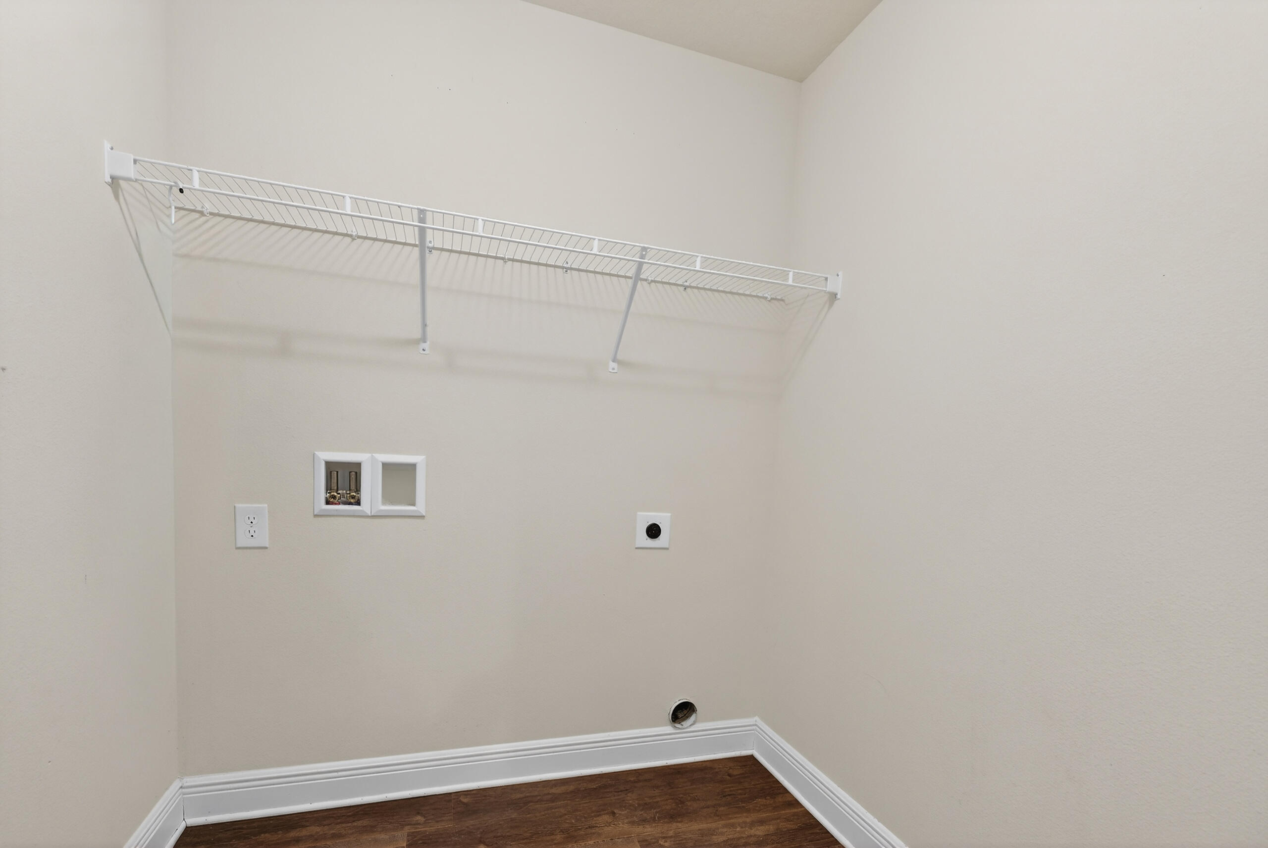5733 Marigold Loop Crestview, FL 32539 - Photo 38 of 45 a view of a small space with racks on the wall
