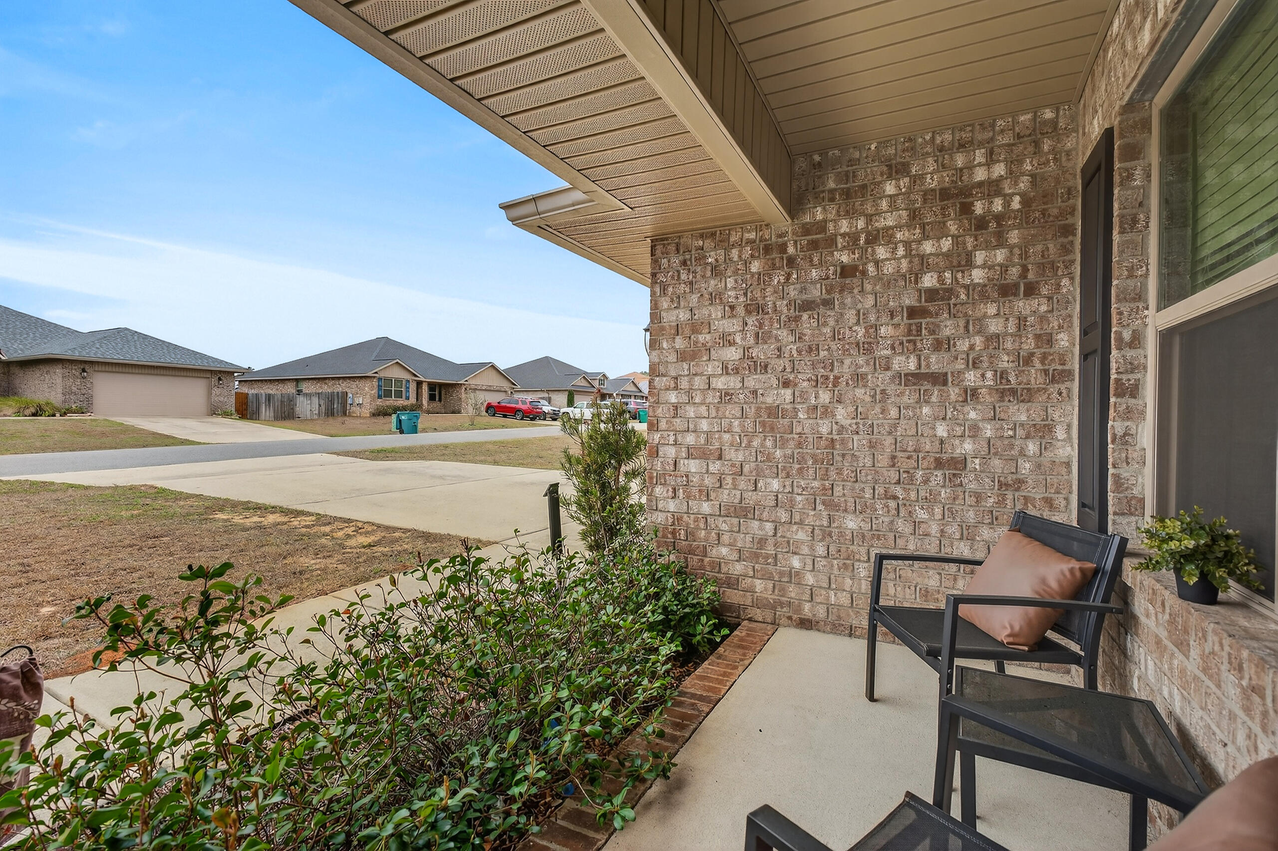 5733 Marigold Loop Crestview, FL 32539 - Photo 7 of 45 a view of a house with backyard and sitting area