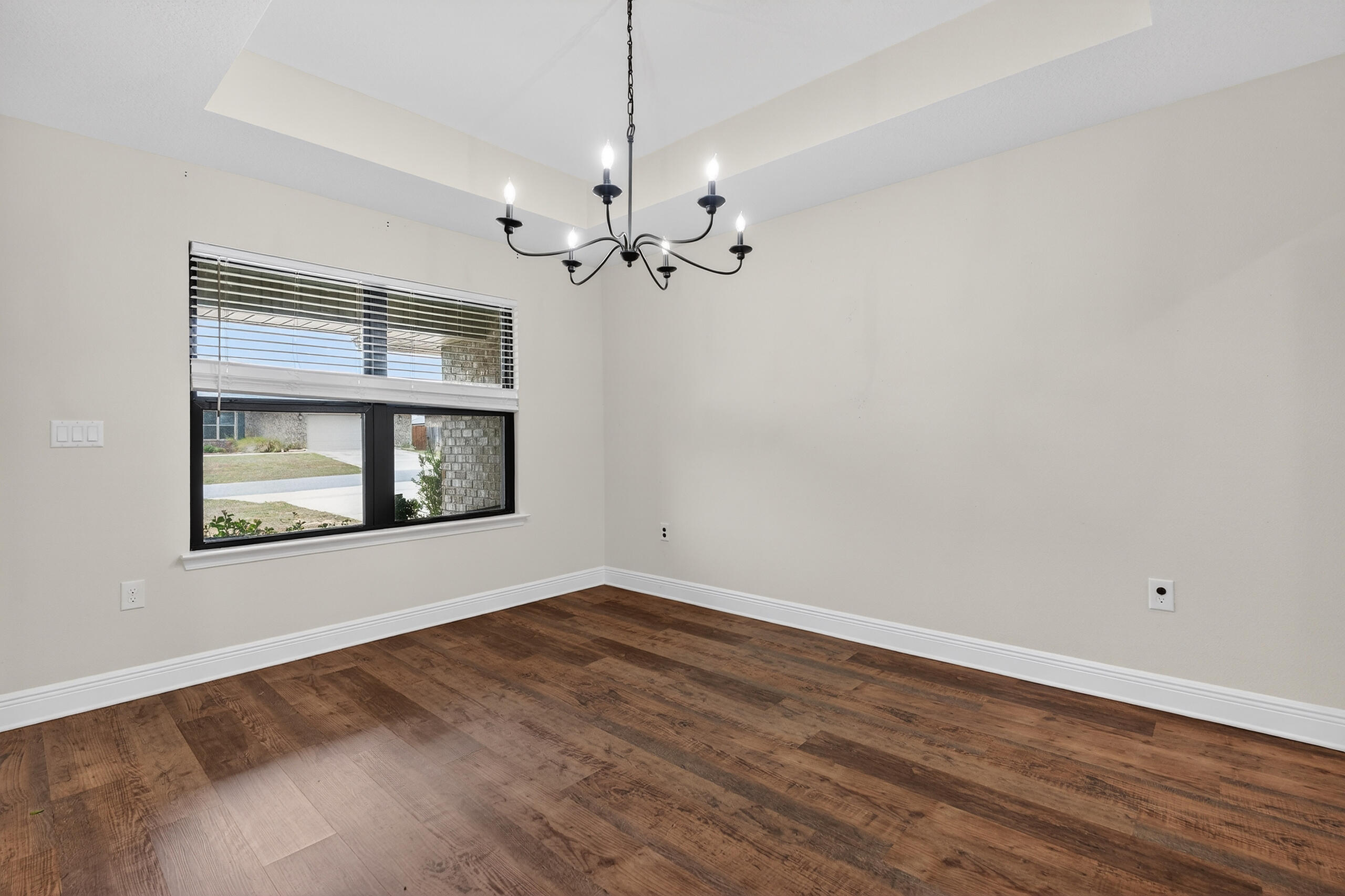 5733 Marigold Loop Crestview, FL 32539 - Photo 8 of 45 a view of a room with a ceiling fan and a window