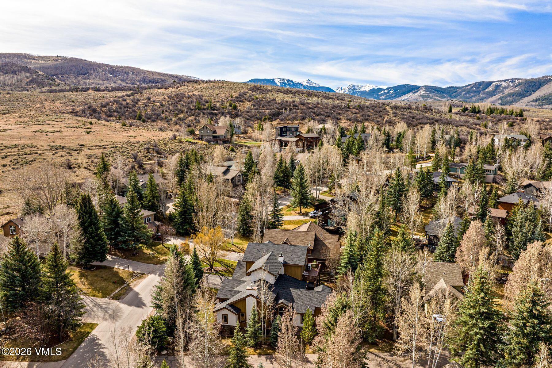 91 Creamery Trail Edwards, CO 81632 - Photo 42 of 44 a view of a city with mountains in the background