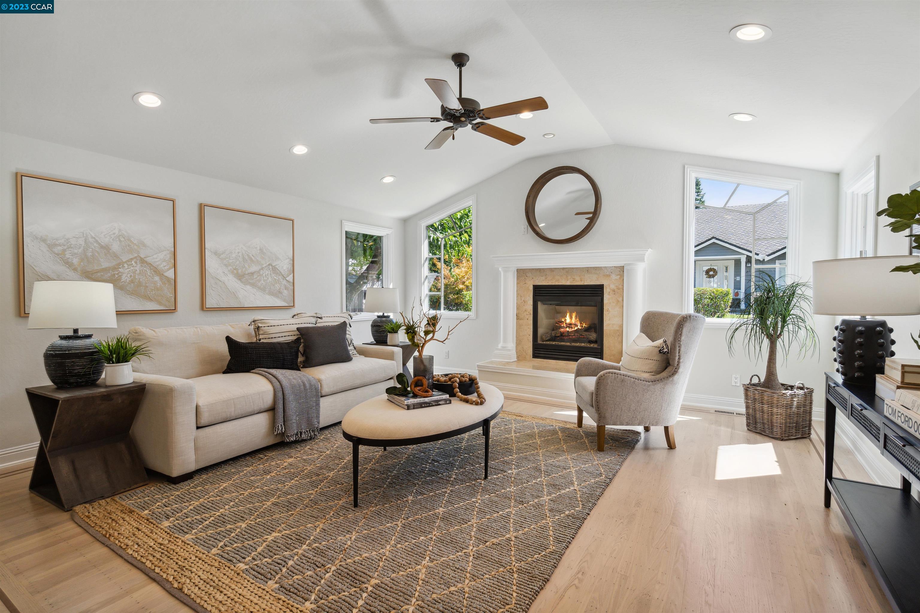 23 Ardith Lane Alamo, CA 94507 - Photo 1 of 60 a living room with furniture a fireplace a rug and a window