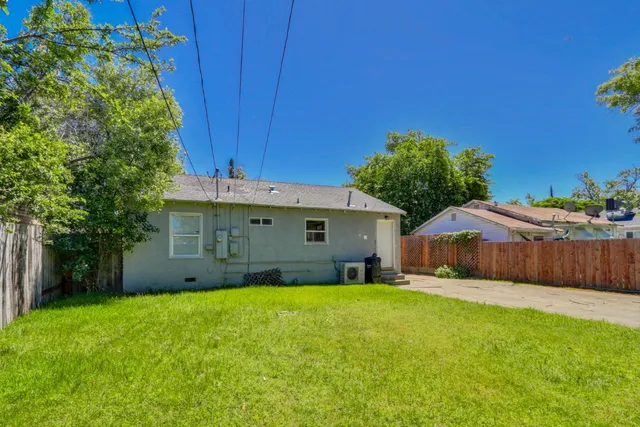 a house view with a garden space
