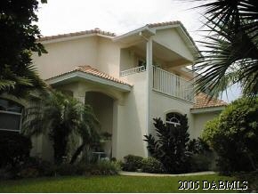 35 Beach Street Ponce Inlet, FL 32127 - Photo 1 of 7 a view of a house with a yard
