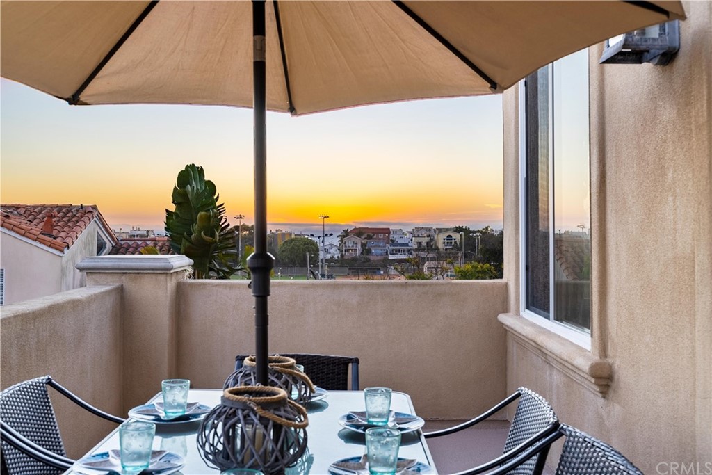 a view of a house with a flower garden