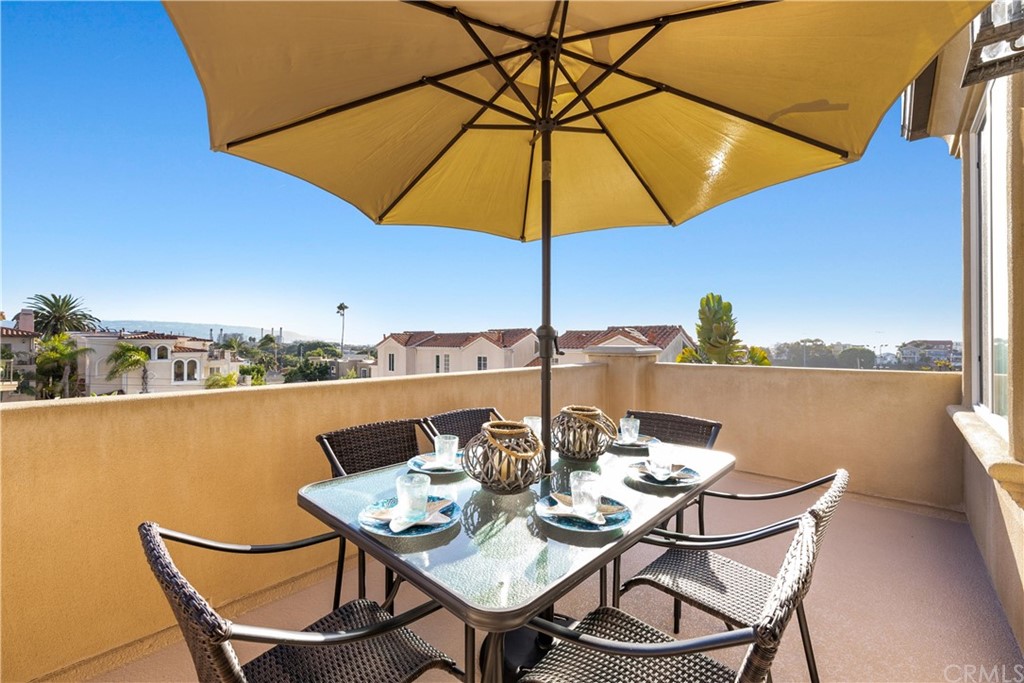 644 10th Street Hermosa Beach, CA 90254 - Photo 14 of 60 a living room with furniture and a fireplace