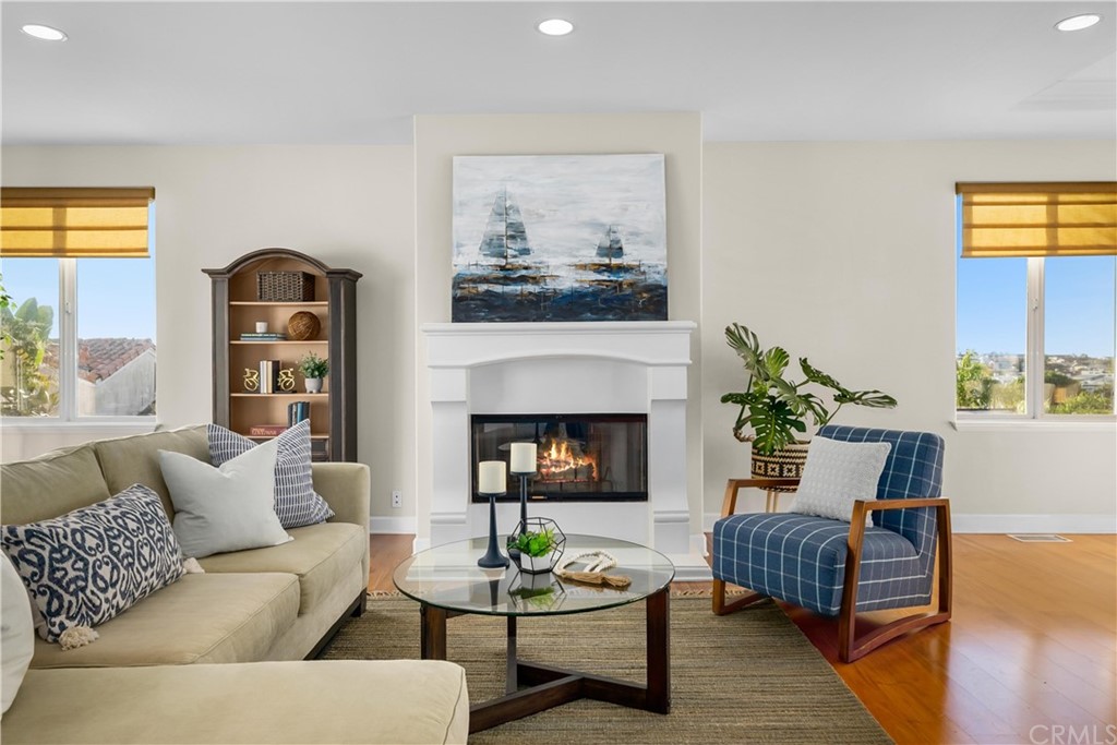 644 10th Street Hermosa Beach, CA 90254 - Photo 17 of 60 a bathroom with a granite countertop sink a mirror and vanity