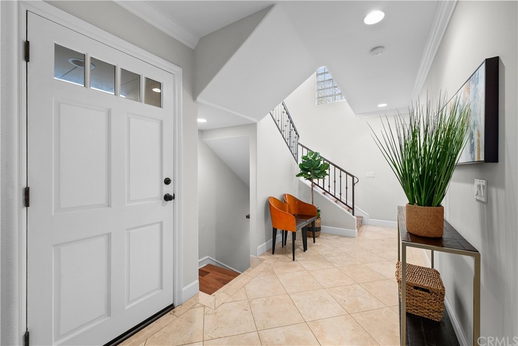 644 10th Street Hermosa Beach, CA 90254 - Photo 22 of 60 a bedroom with a bed and wooden floor