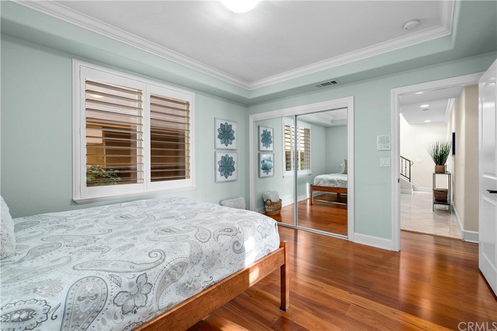 644 10th Street Hermosa Beach, CA 90254 - Photo 24 of 60 a bathroom with a granite countertop sink a mirror and a shower