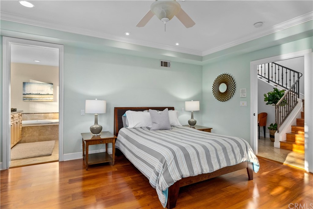 644 10th Street Hermosa Beach, CA 90254 - Photo 32 of 60 a bathroom with a sink a large mirror and a bathtub