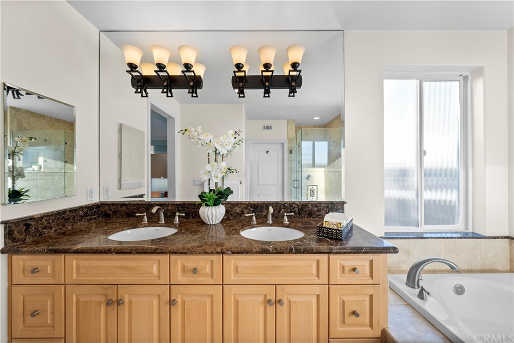 644 10th Street Hermosa Beach, CA 90254 - Photo 37 of 60 a view of a work space with furniture and wooden floor