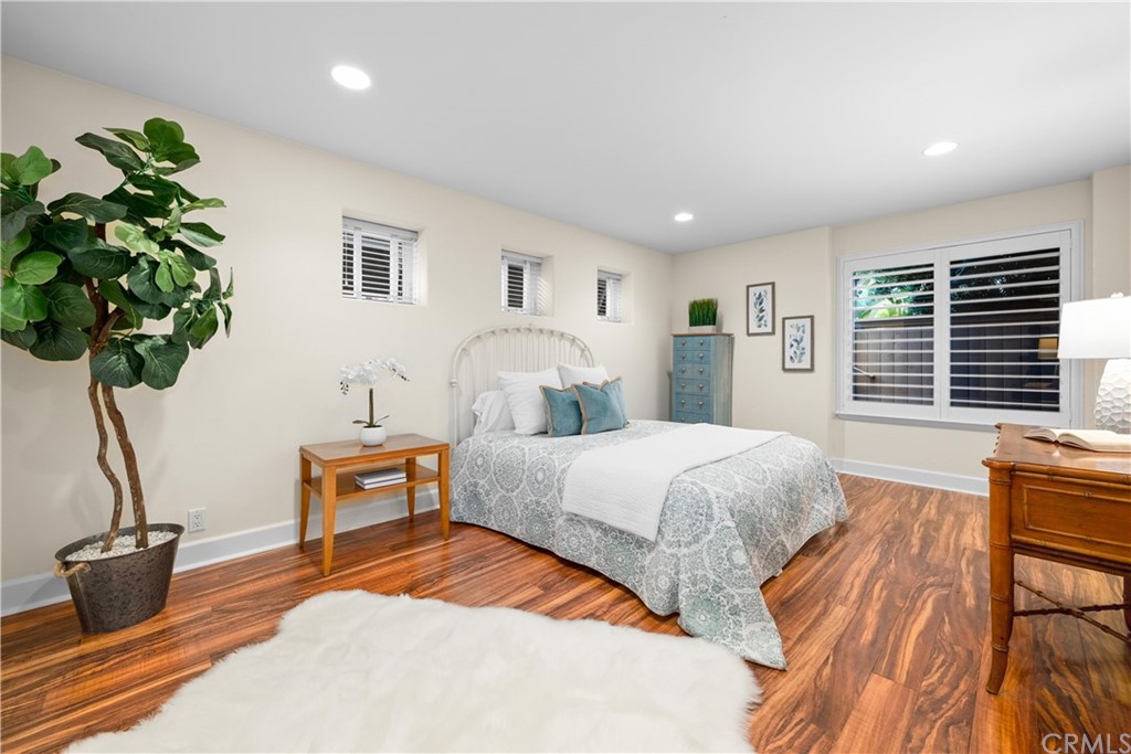 644 10th Street Hermosa Beach, CA 90254 - Photo 42 of 60 a view of a white house with a yard and table