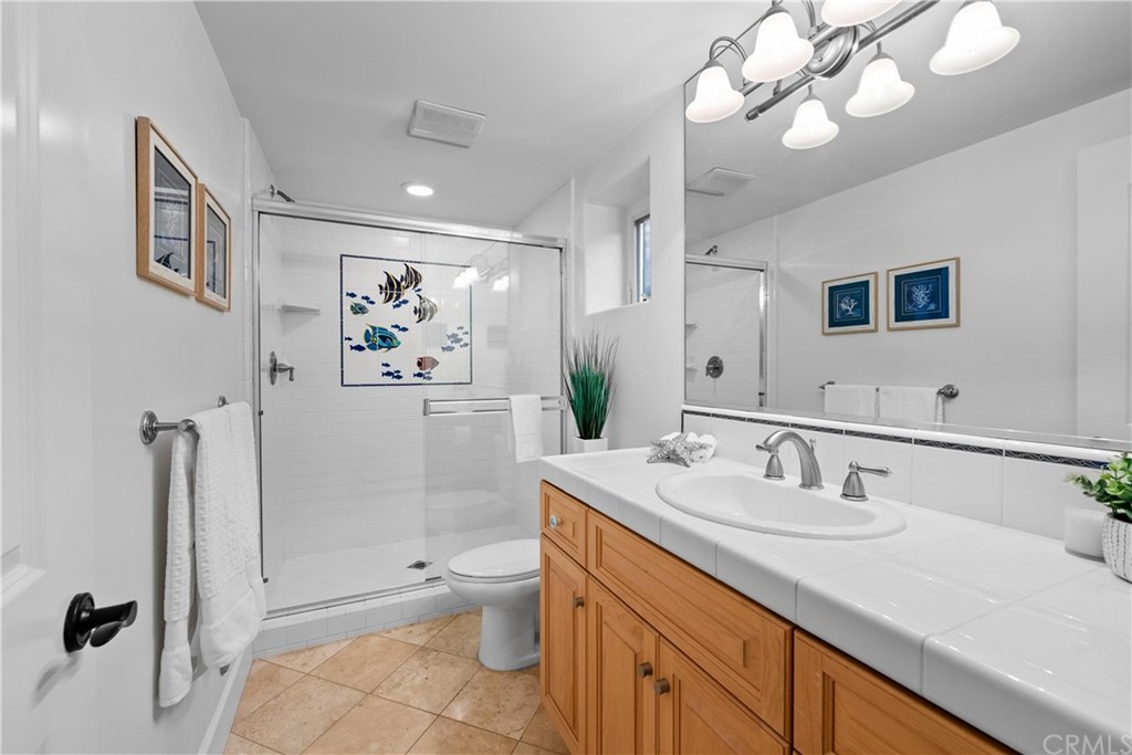 644 10th Street Hermosa Beach, CA 90254 - Photo 43 of 60 a front view of a house with garden