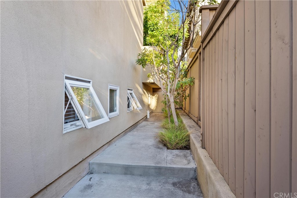 644 10th Street Hermosa Beach, CA 90254 - Photo 60 of 60 a front view of a house with garden
