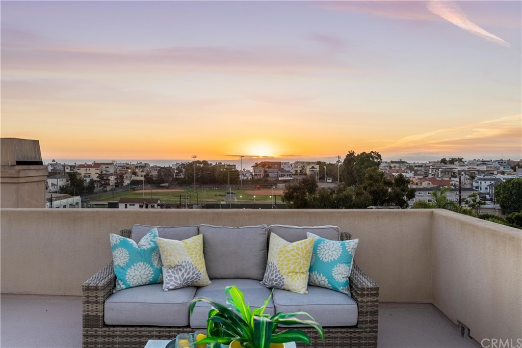 644 10th Street Hermosa Beach, CA 90254 - Photo 8 of 60 an aerial view of a city with lots of residential buildings and ocean view in back