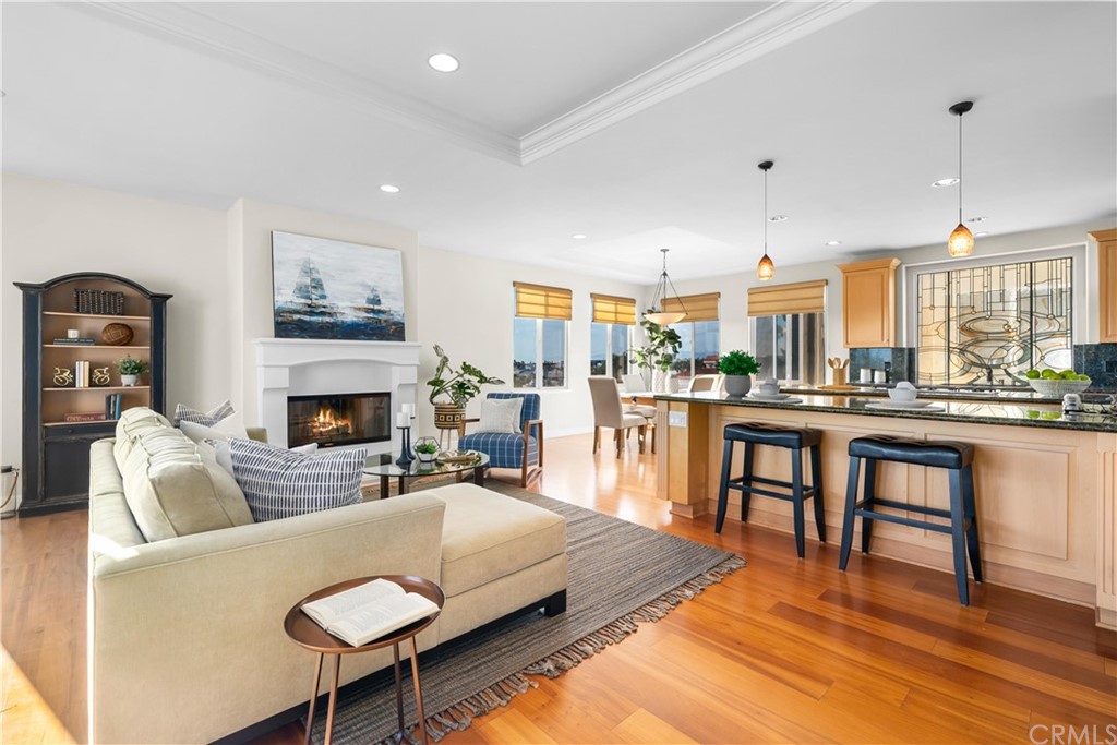 644 10th Street Hermosa Beach, CA 90254 - Photo 10 of 60 a white building with a clock on the side