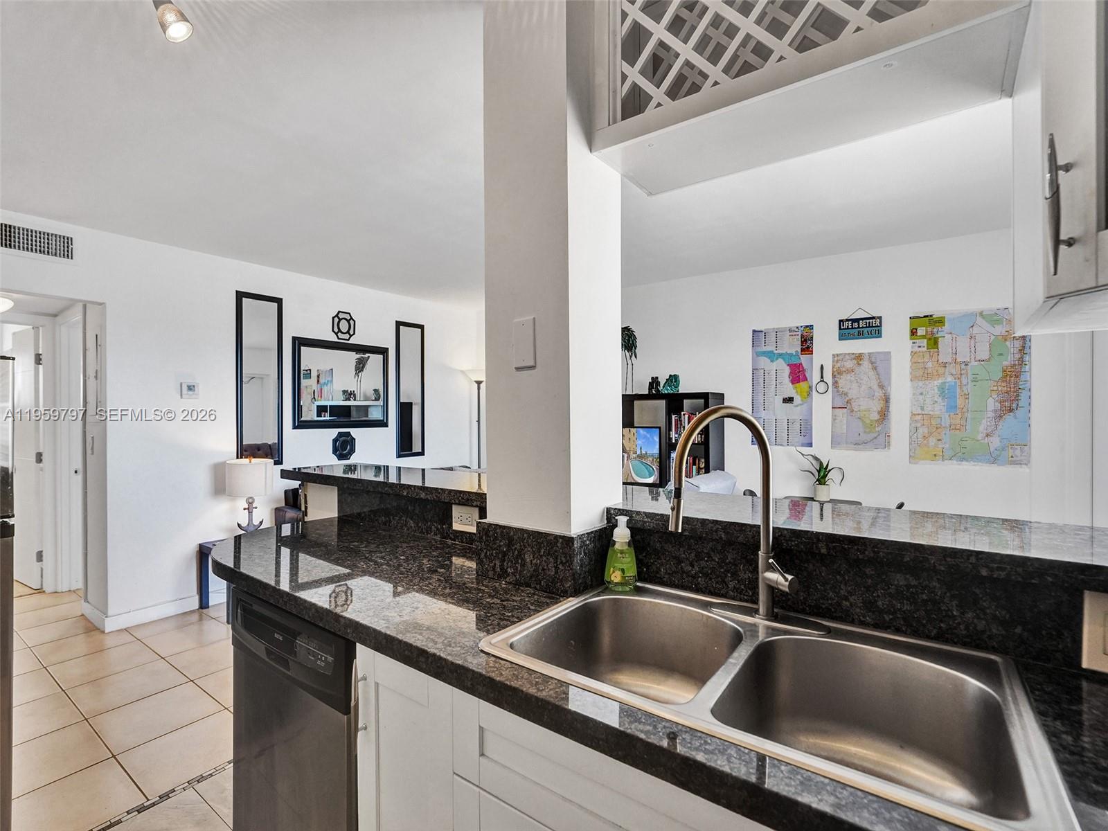 1815 North Surf Road, Unit 202 Hollywood, FL 33019 - Photo 21 of 32 a close view of sink and tap