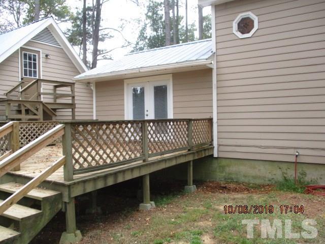 133 Tant Road Zebulon, NC 27597 - Photo 8 of 18 a front view of a house with balcony