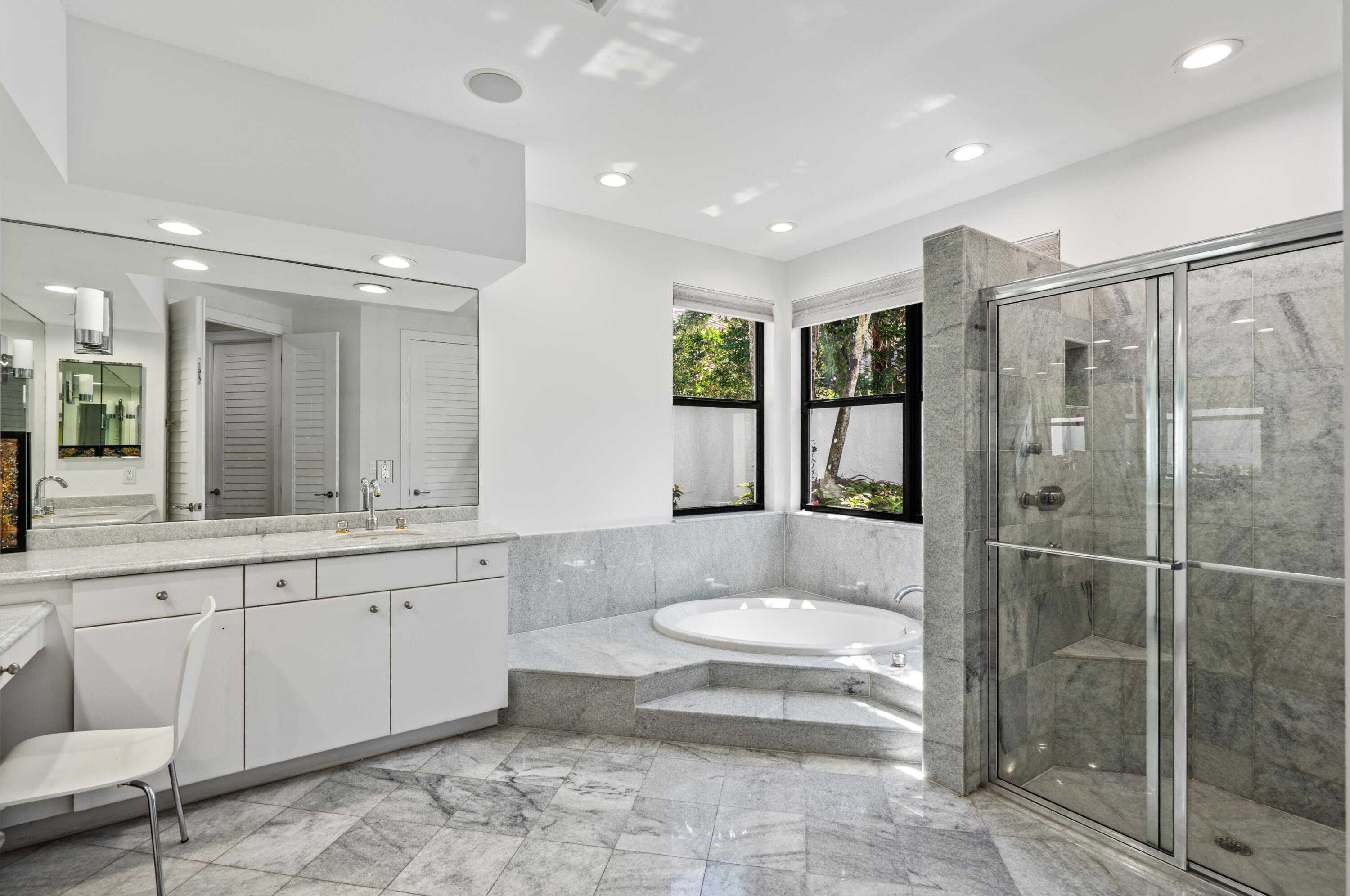3098 Northwest 60th Street Boca Raton, FL 33496 - Photo 16 of 30 a bathroom with a sink toilet and shower