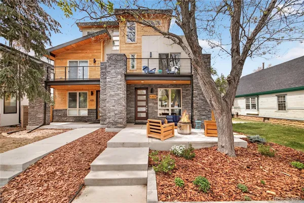 a front view of a house with a patio
