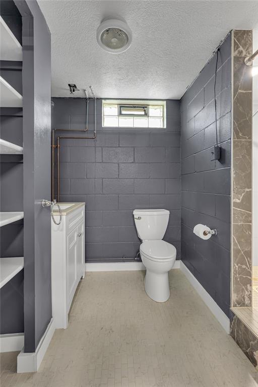 1044 Charles Street Monaca, PA 15061 - Photo 25 of 31 a bathroom with a toilet sink and mirror
