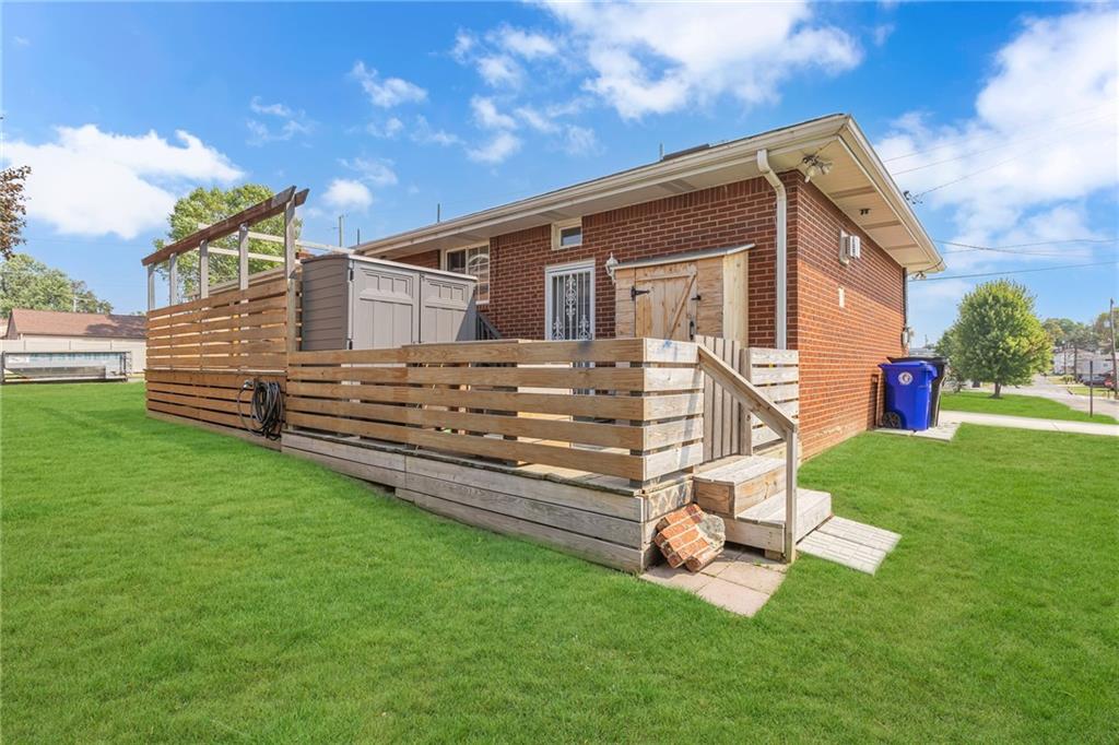 1044 Charles Street Monaca, PA 15061 - Photo 27 of 31 a view of a backyard with a garden and deck