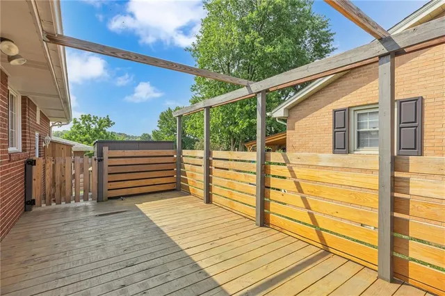 a view of outdoor space with deck and wooden floor