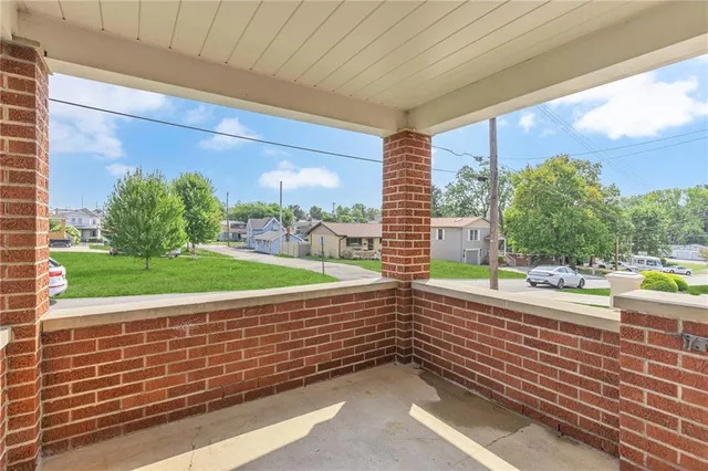 a view of a room with window and a yard
