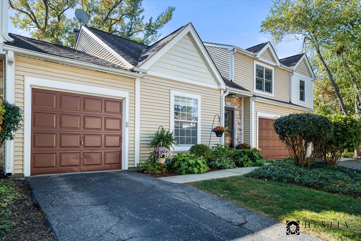 front view of a house and a yard