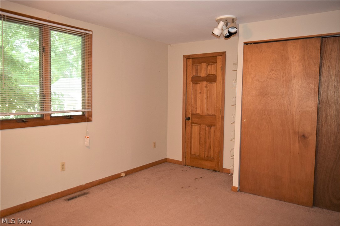 7813 Jones Road Cleveland, OH 44105 - Photo 16 of 22 Bedroom 2 on 2nd Floor with a door to a small balcony