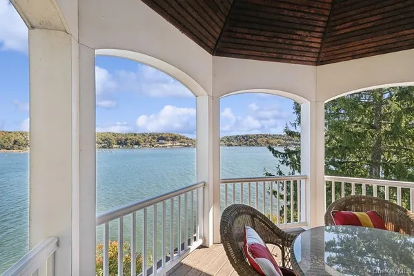 a view of balcony with furniture