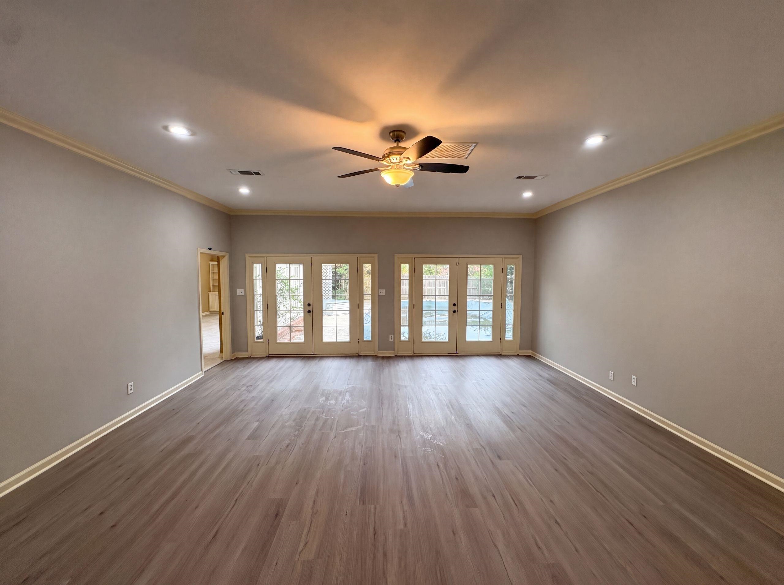 9424 Gotten Road Germantown, TN 38139 - Photo 11 of 27 Spacious room featuring wood-finish flooring, recessed lighting, and a ceiling fan