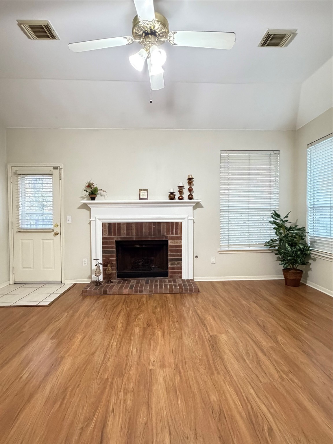 62 Hollylaurel Drive Spring, TX 77382 - Photo 5 of 15 Spacious living room with fireplace.