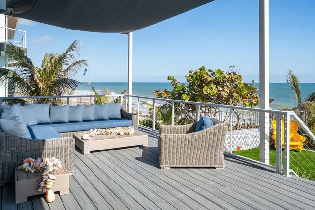 a view of a roof deck with couches