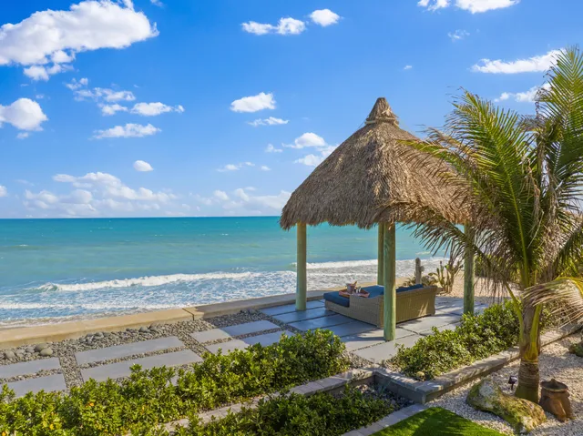 a view of a street with an ocean view
