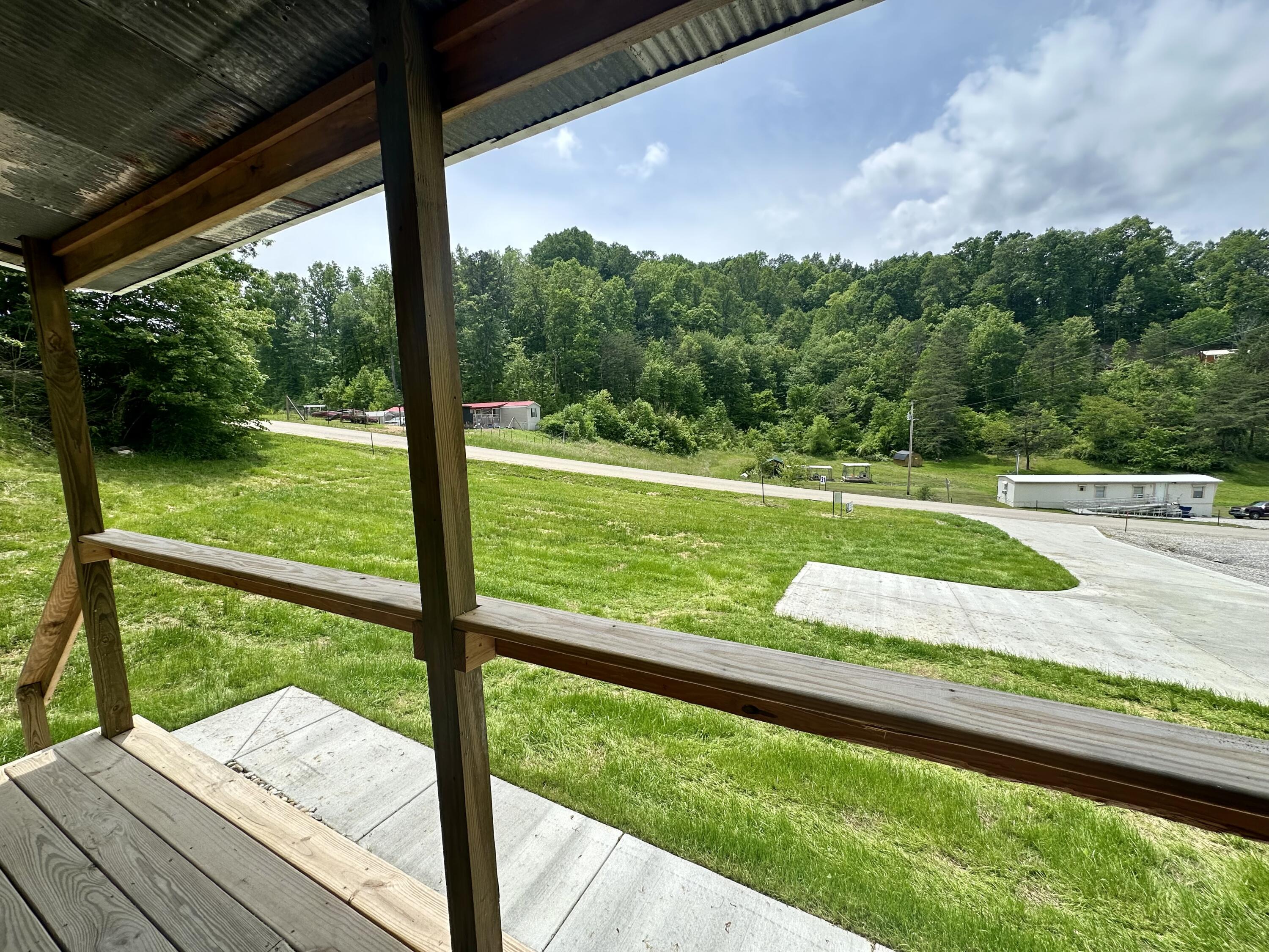 409 Freeman Branch Road East Bernstadt, KY 40729 - Photo 8 of 43 PORCH VIEWS