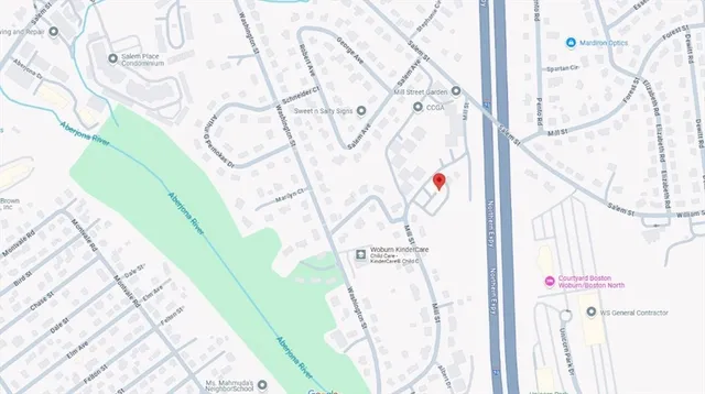 a close up of a white curtain with white walls