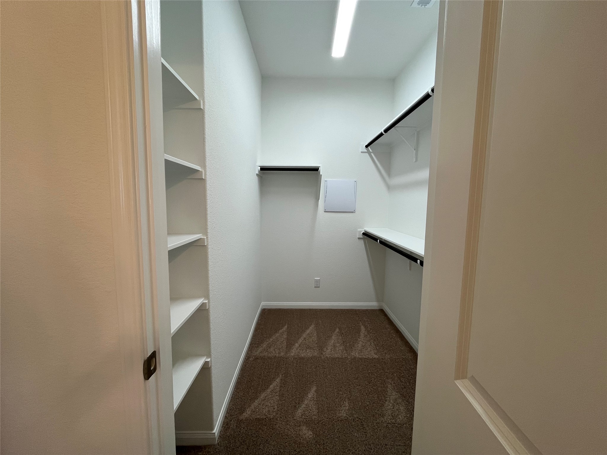 8522 Wellspring Loop Round Rock, TX 78665 - Photo 17 of 37 Built in shelving in master closet. For demonstration purposes only. This will be the same interior layout. Colors can vary.