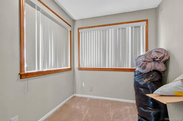 a view of a chair near a window