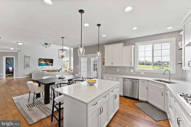 a bathroom with a double vanity sink mirror double and shower